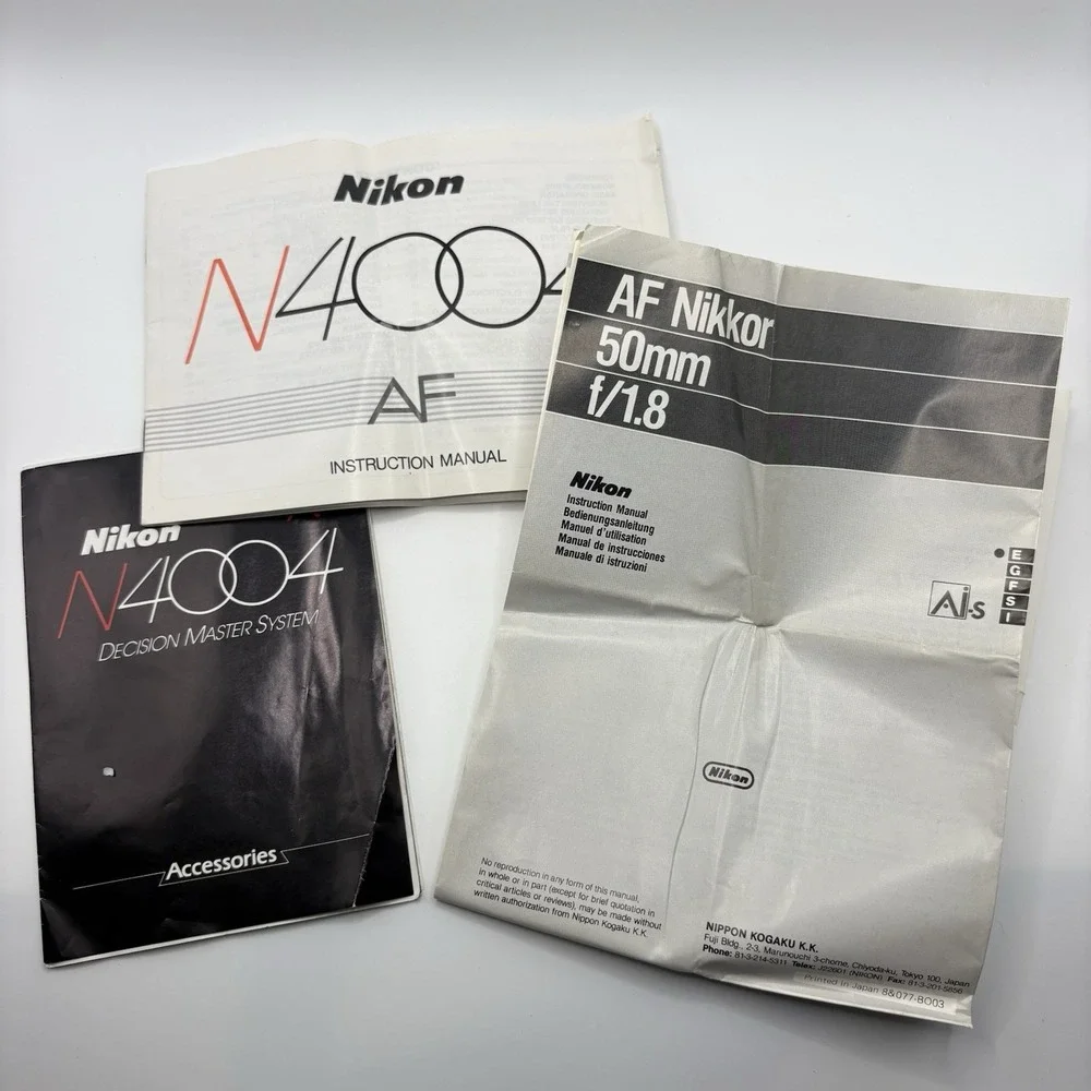 Vintage Nikon N4004 AF 35mm SLR Film Camera Body Only W/ Manuals Bag Powers On